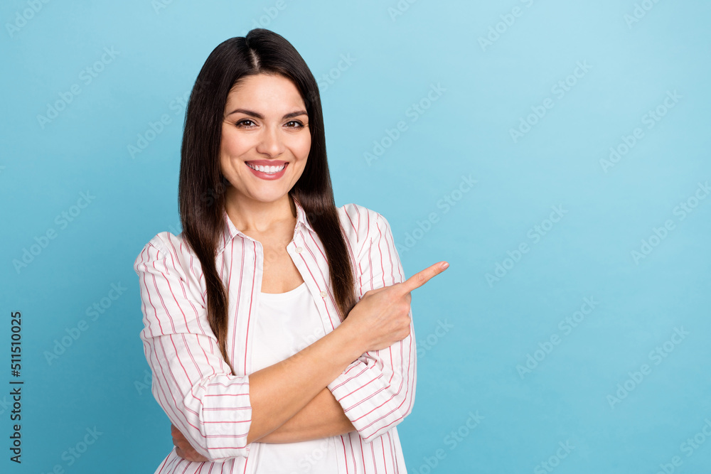 Portrait of attractive cheerful long-haired girl demonstrating copy space ad idea isolated over blue pastel color background Portrait of attractive cheerful long-haired girl demonstrating copy space ad idea isolated over blue pastel color background