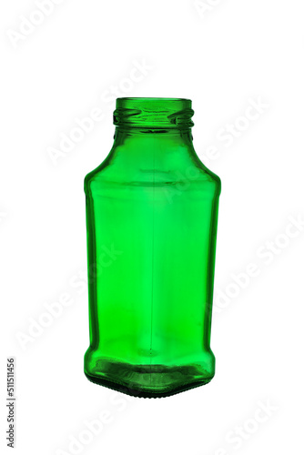 Empty bottle with a wide neck of a square shape made of transparent, green glass. Isolated on a white background, close-up