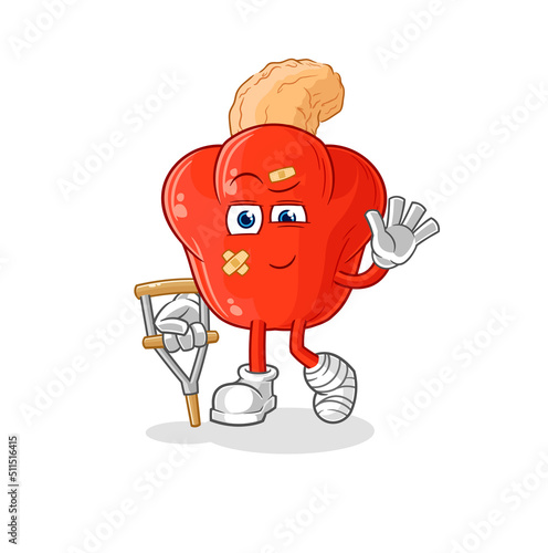 cashew fruit sick with limping stick. cartoon mascot vector
