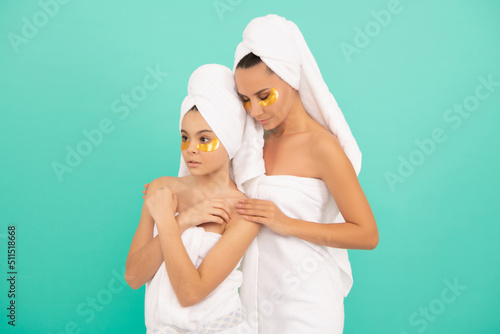 family spa of mother and daughter with skincare patch