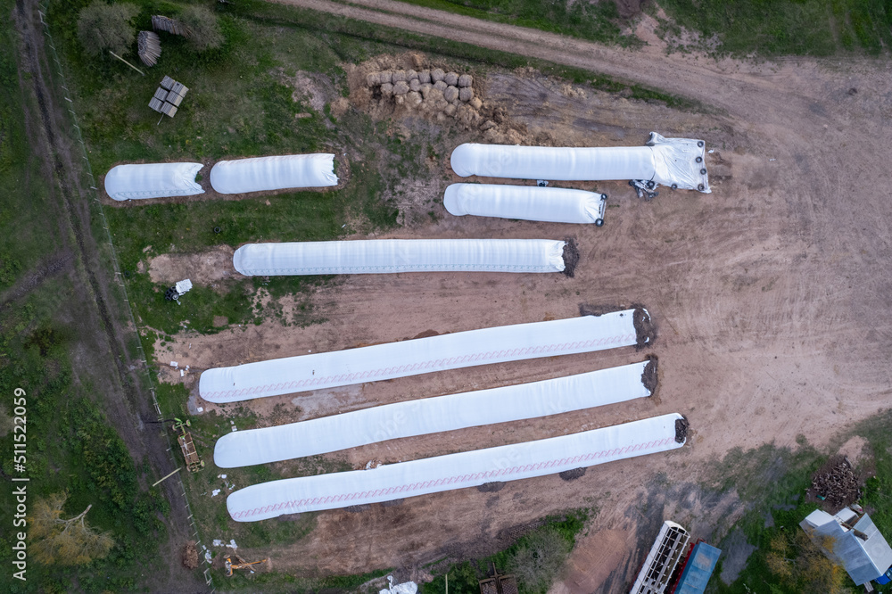 aerial view of silo bag in a field. Rural, country image of the  agricultural industry in a field in Argentina. Stock Photo | Adobe Stock
