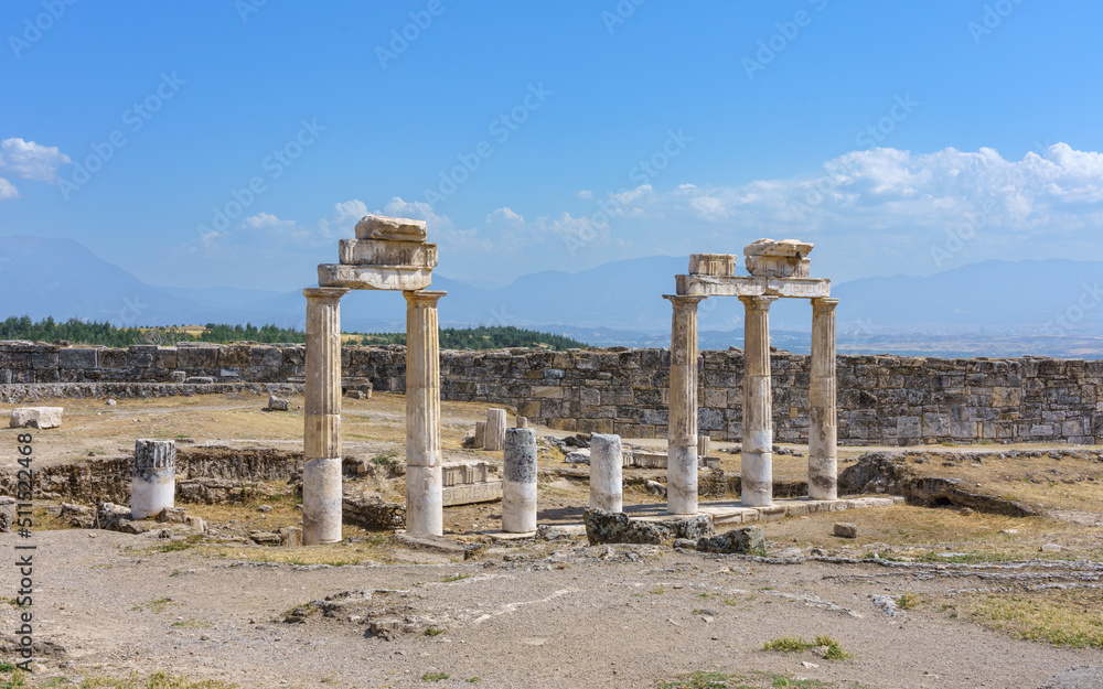 Ancient ruins of columns in Hierapolis city near Pamukkale, Turkey. Unesco World Heritage Site. 