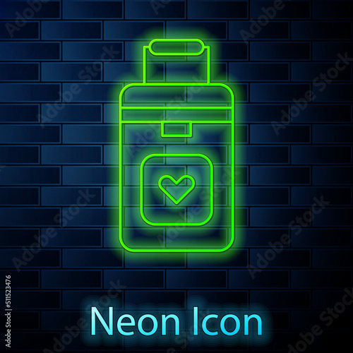 Glowing neon line Cooler box for human organs transportation icon isolated on brick wall background. Organ transplantation concept. Organ container. Vector Illustration