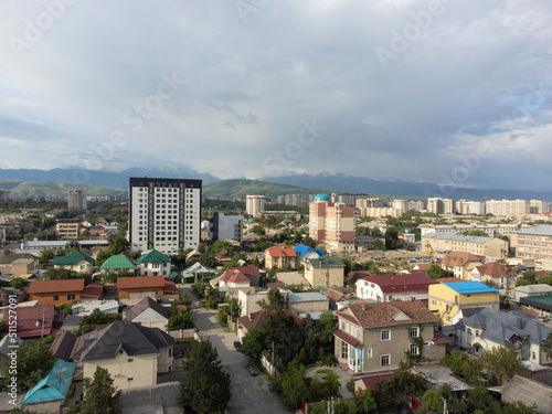 Aerial view of Bishkek, Kyrgyzstan with mountains in background