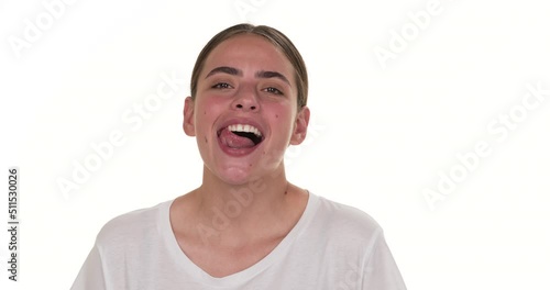 Portrait of white woman sensually smiling and licking her teeth. Isolated on white background.