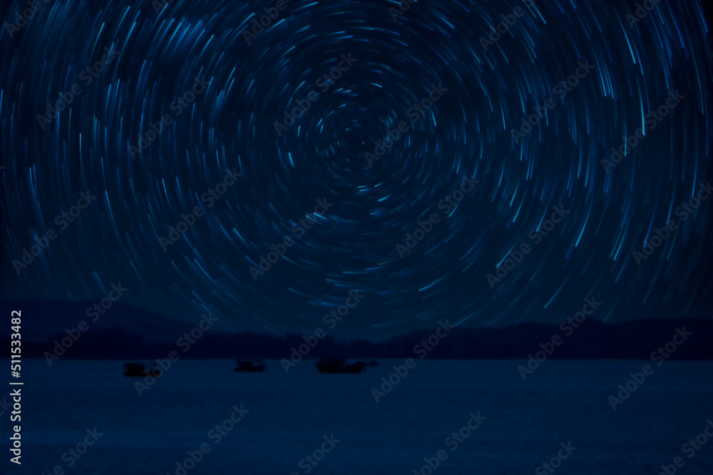 Fototapeta premium Boat crashes in the sea and star trails Climate change.