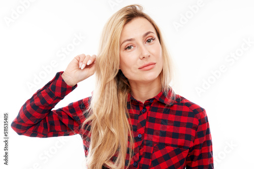 Wallpaper Mural Smart blonde girl in casual holding her head thinks doubts, makes decision isolated on white studio background Torontodigital.ca