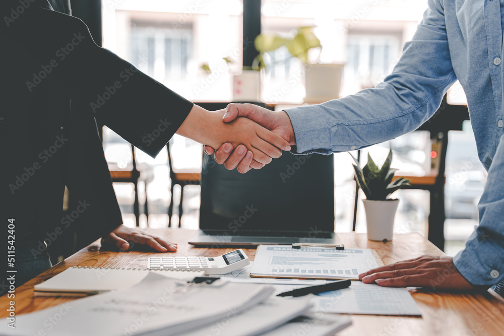 business partner handshake concept Colleagues shaking hands Successful deal after a great meeting. Blurred background. business partner handshake concept Colleagues shaking hands Successful deal after a great meeting. Blurred background.