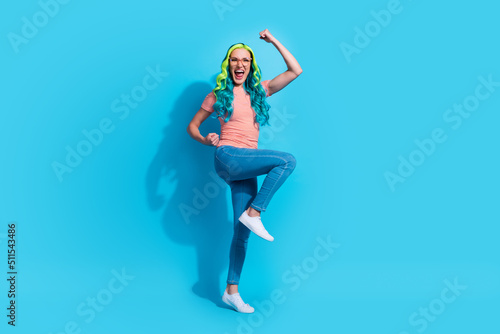 Fototapeta Naklejka Na Ścianę i Meble -  Full body photo of crazy overjoyed celebrate lottery victory win money prize isolated on blue color background