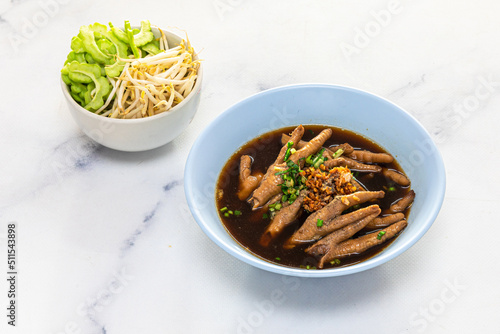 chicken feet soup . Chinese chicken feet soup on background.