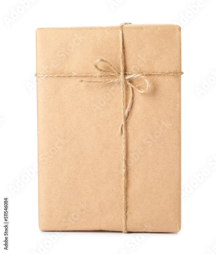 Parcel wrapped with kraft paper and twine isolated on white