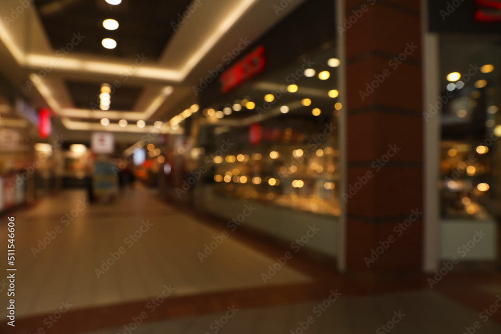 Blurred view of shopping mall interior. Bokeh effect