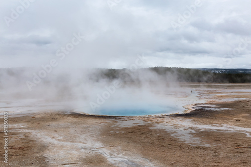 Hot spring Geyser with colorful water in American Landscape. Celestine Pool in Yellowstone National Park, Wyoming, United States. Nature Background.