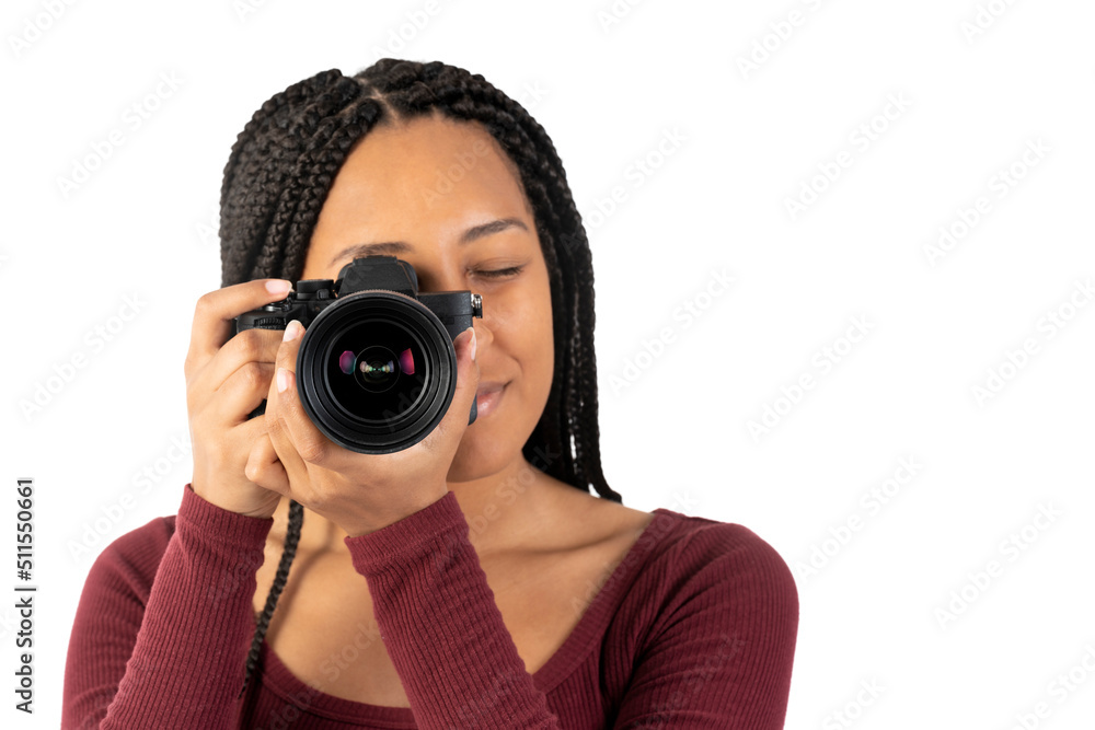 Young black woman with a photo camera in the studio Young black woman with a photo camera in the studio