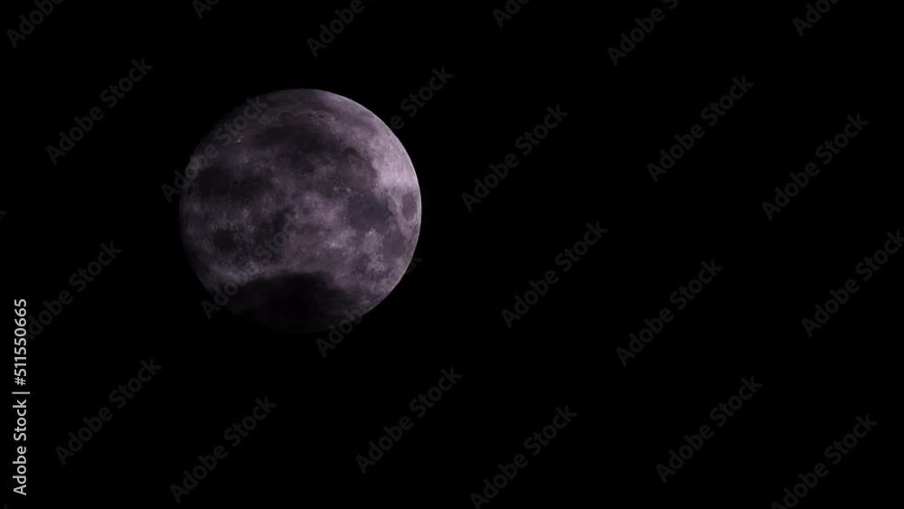 Full Moon fast movement wrapped with dark black clouds. Halloween witchcraft mood. Atmospheric dark night sky with moon for mystic thriller mood concept. Full Moon fast movement wrapped with dark black clouds. Halloween witchcraft mood. Atmospheric dark night sky with moon for mystic thriller mood concept.