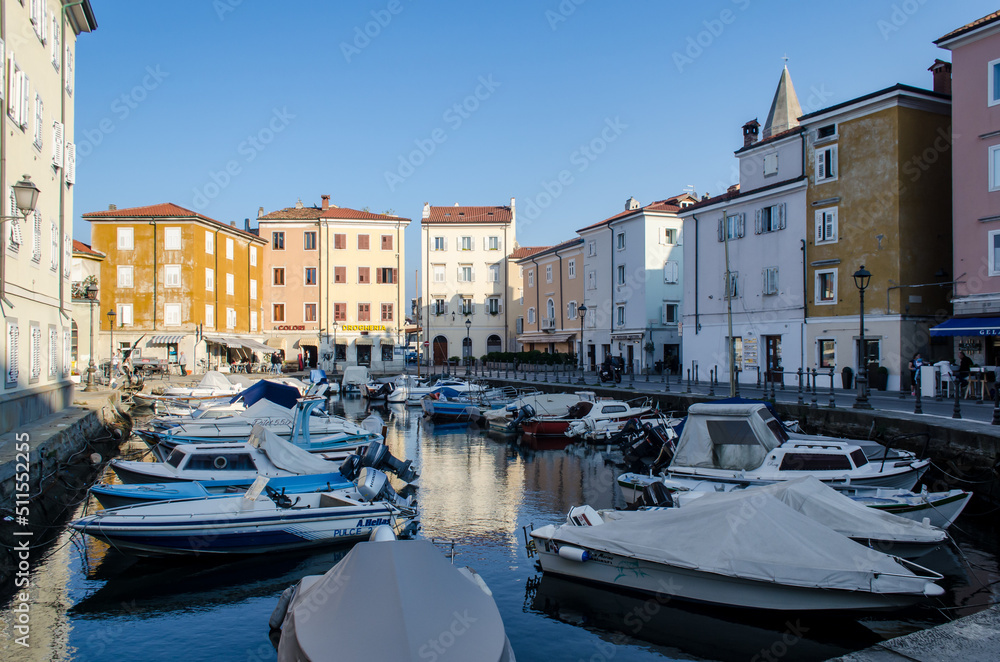 Il piccolo porto di Muggia lungo la prima tappa della Via Flavia, cammino che segue la costa del Friuli Venezia Giulia da Lazzaretto ad Aquileia
