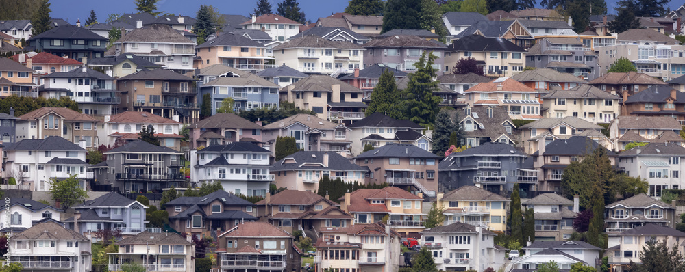 Residential homes on a mountain in suburban neighborhood. Modern Cityscape. Port Coquitlam, Vancouver, BC, Canada.
