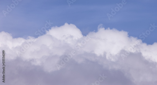 View of Cloudscape during a cloudy blue sky sunny day. Taken on the West Coast of British Columbia, Canada. © edb3_16