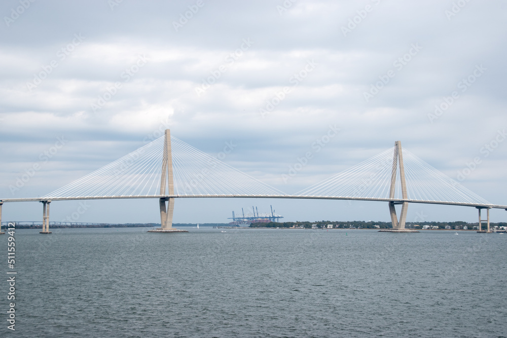 The Ravenel Bridge during a cloudy day over the Cooper River in Charleston, South Carolina The Ravenel Bridge during a cloudy day over the Cooper River in Charleston, South Carolina