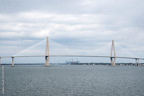 The Ravenel Bridge during a cloudy day over the Cooper River in Charleston, South Carolina © Joseph Creamer