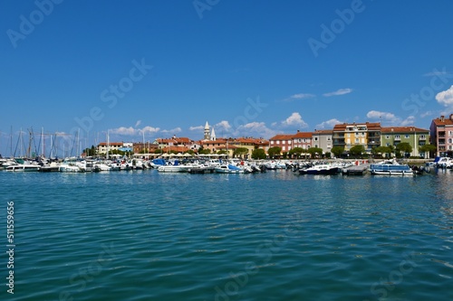 Izola, Slovenia - May 10 2022: Harbour and the town of Izola in Istria, Slovenia © kato08