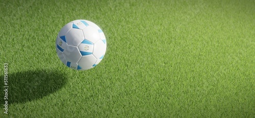 Football or soccer ball design with flag of Guatemala against grass pitch backdrop. 3D rendering