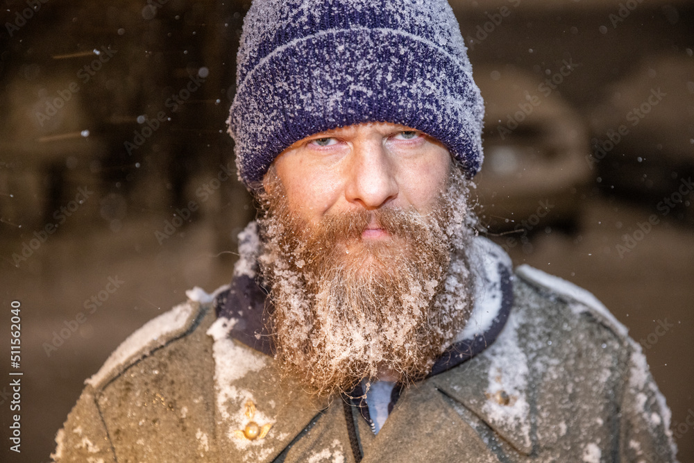 Frozen man in a snowstorm covered in snow and ice Frozen man in a snowstorm covered in snow and ice