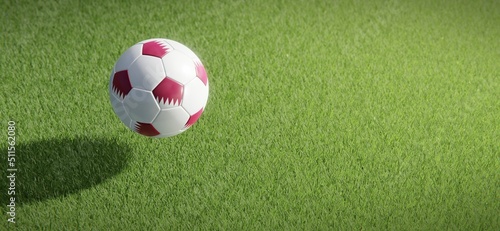 Football or soccer ball design with flag of Qatar against grass pitch backdrop. 3D rendering
