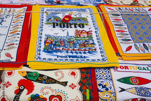 Traditional portuguese textile souvenirs on the local market in Porto
