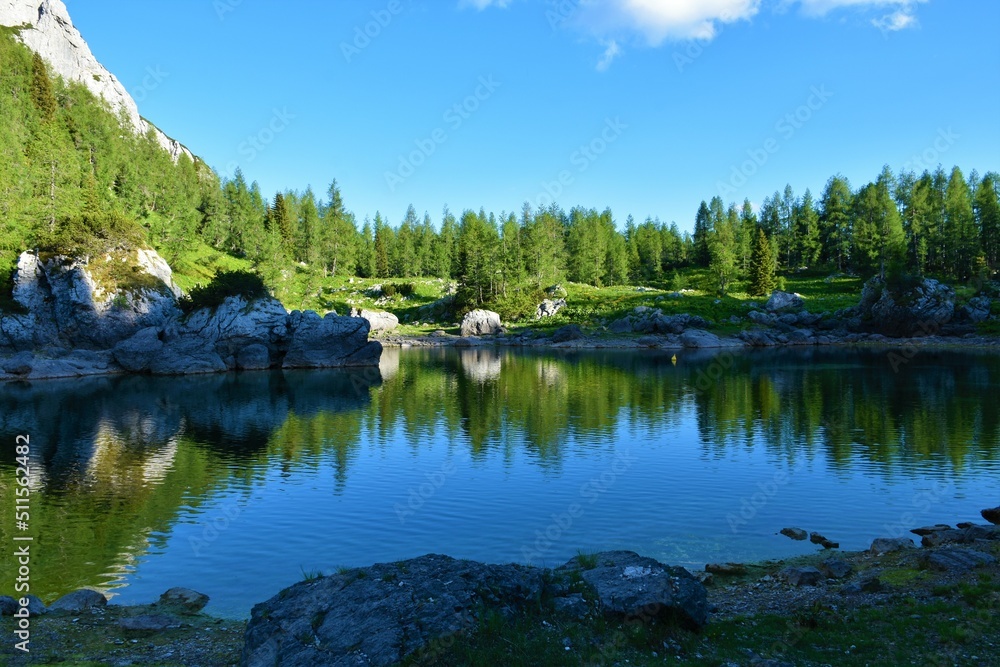 Double lake or Dvojno jezero in Triglav lakes valley in Julian alps and Triglav national park in Slovenia with a reflection on the water