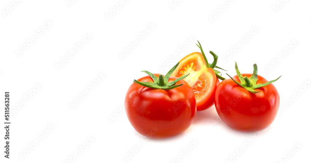 Fresh red tomatoes on a white background. Close-up, design, banner. Fresh red tomatoes on a white background. Close-up, design, banner.