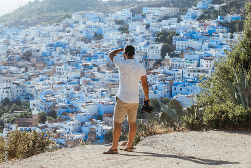 person enjoy the view of Chefchaouen © DanielViero