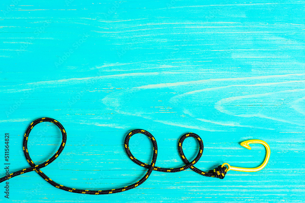 Fishhook bracelet on a wooden background Fishhook bracelet on a wooden background