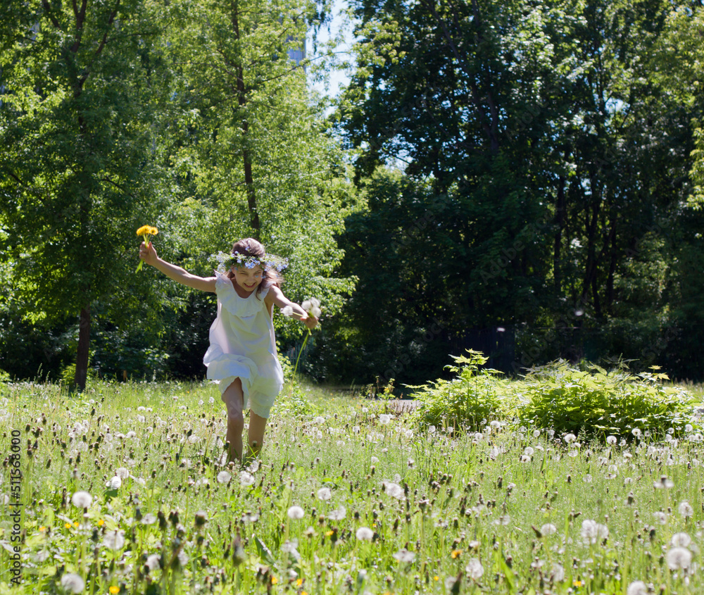 a little girl runs through the forest. a little girl runs through the forest.