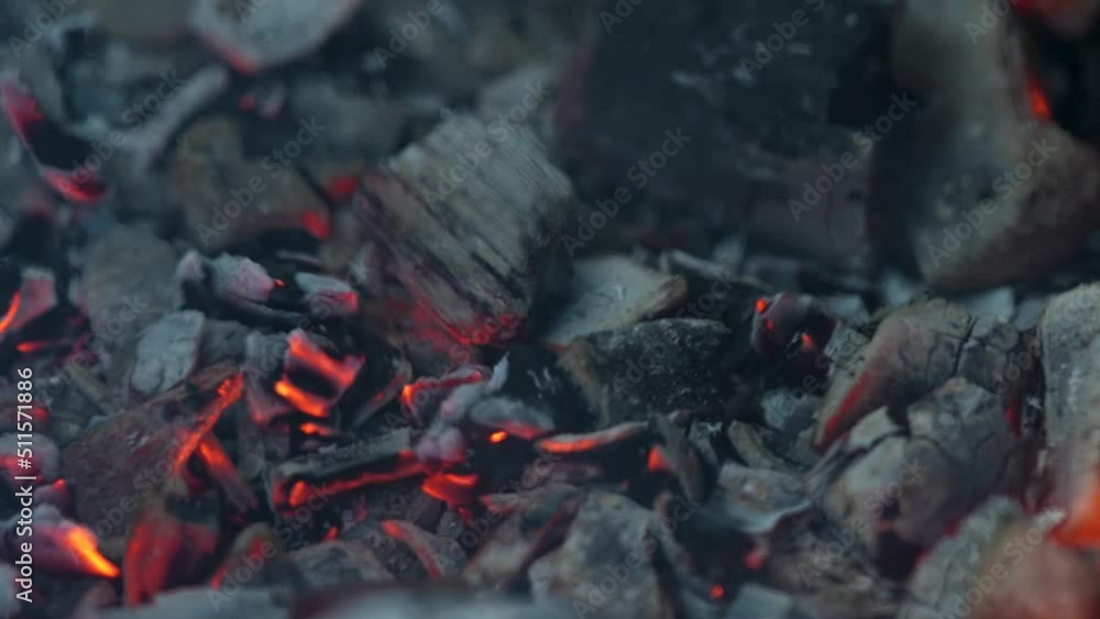 Close-up view of hot burning charcoal. Hot trembling air because of flames. Close-up view of hot burning charcoal. Hot trembling air because of flames.