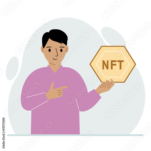 NFT concept. The man is holding nft in his hand. Works of art using non-fungible tokens for auctions, sale and purchase of works of art.
