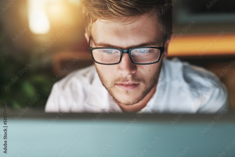 Ill get the job done, no matter the time. Cropped shot of a young designer working late at the office. Ill get the job done, no matter the time. Cropped shot of a young designer working late at the office.