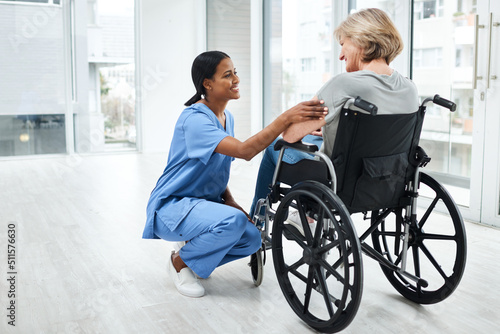 She doesnt just see the patient, she sees the person. Shot of a young nurse caring for a senior woman in a wheelchair.
