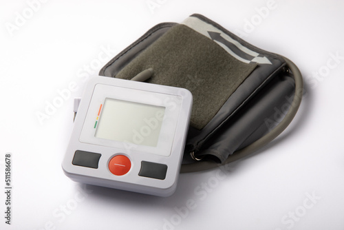 Digital blood pressure monitor isolated on white. Medical equipment blood pressure monitor. Healthcare. Place for text. Medicine concept. The concept of cardiology.