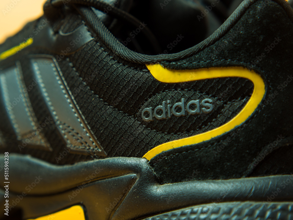 moscow russia 08 06 2022 adidas originals ozweego sneakers black with  yellow elements on the sole .rare adidas model Stock Photo | Adobe Stock