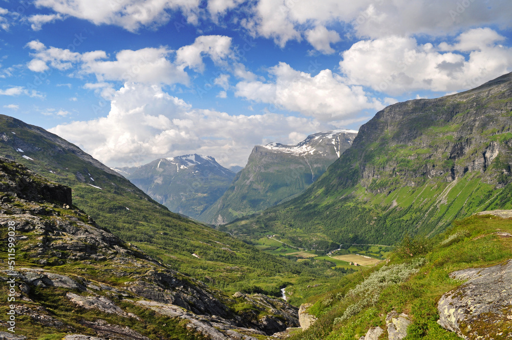 Panorama of high mountains with a deep valley in the north of Europe in Norway in the town of Geiranger.