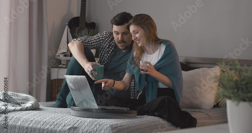Young couple watching a movie together