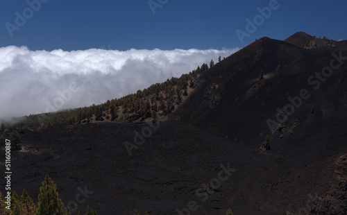 La Palma, long-range popular hiking route Ruta de Los Volcanes, landscapes around black crater of El Duraznero volcano, formed in 1949