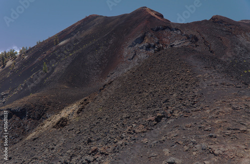 La Palma, long-range popular hiking route Ruta de Los Volcanes, landscapes around black crater of El Duraznero volcano, formed in 1949