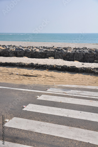 Pedestrian crossing leading to the ocean at Arichal Munai, Dhanushkodi, Tamil Nadu, India photo