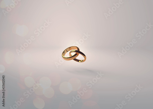 фотографія Interlocking gold wedding rings with sparkling reflections on a soft cream background for invitations and placards