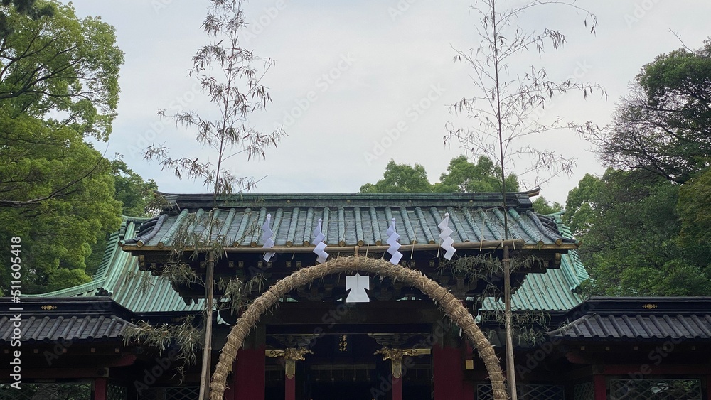 Japanese shrine on the June purification ceremonial setting, with ring of “Oharae” architecture that people go through 3 times from different directions as rituals. Photo taken year 2022 June 18th ea Japanese shrine on the June purification ceremonial setting, with ring of “Oharae” architecture that people go through 3 times from different directions as rituals. Photo taken year 2022 June 18th ea