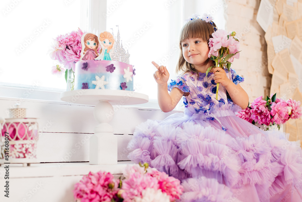 Portrait of a girl three years old in a pink dress Portrait of a girl three years old in a pink dress