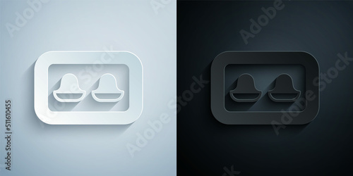 Paper cut Earplugs with storage box icon isolated on grey and black background. Ear plug sign. Noise symbol. Sleeping quality concept. Paper art style. Vector