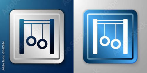 White Gymnastic rings icon isolated on blue and grey background. Playground equipment with hanging rope with rings. Silver and blue square button. Vector